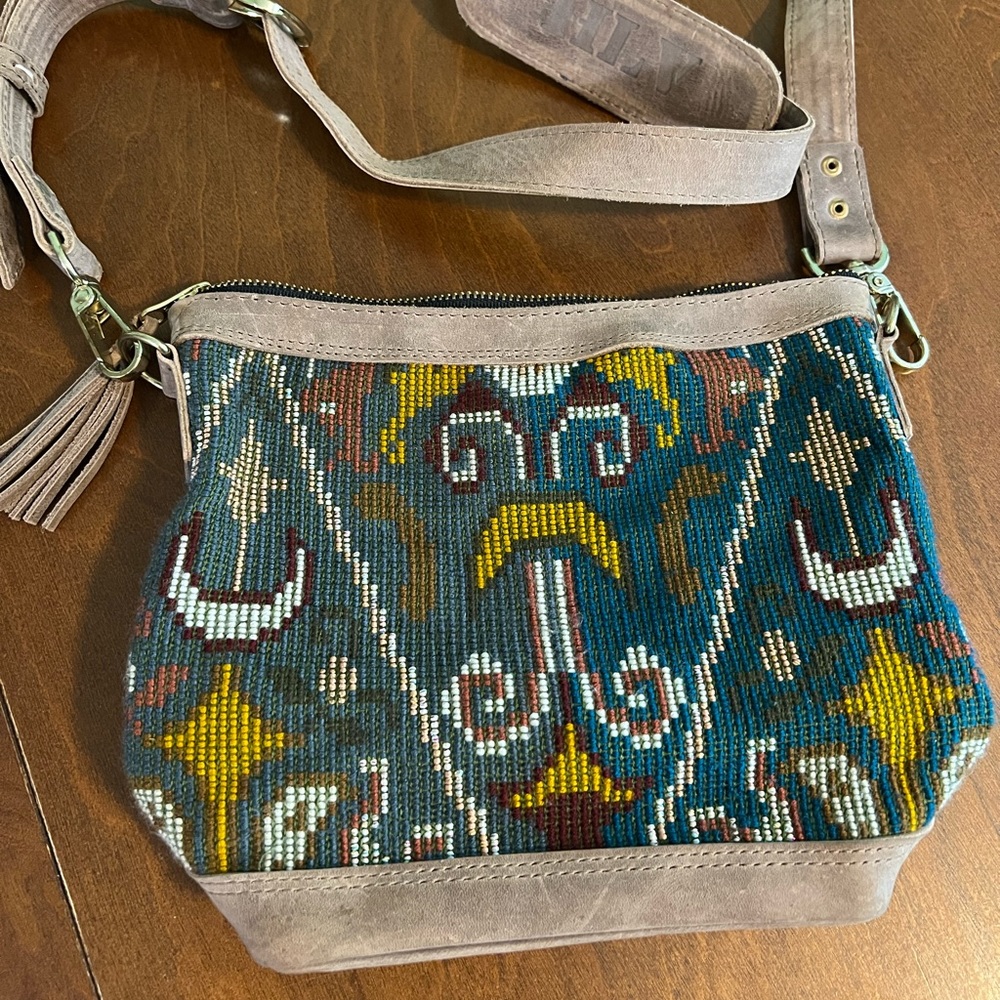 Leather and woven mini crossbody.  Made and Woven by artisans in Guatemala.